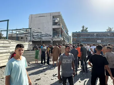 Palestinians inspect a school sheltering displaced people, after it was hit by an Israeli strike, amid the Israel-Hamas conflict, in Nuseirat in the central Gaza Strip, September 11, 2024. REUTERS/Khamis Al-Rifi