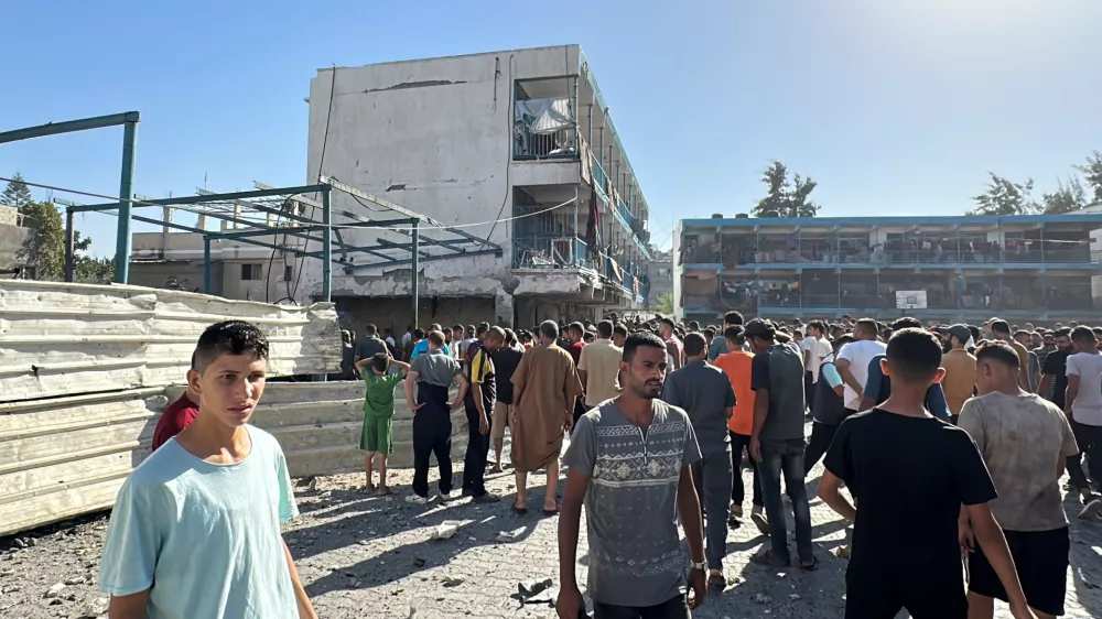 Palestinians inspect a school sheltering displaced people, after it was hit by an Israeli strike, amid the Israel-Hamas conflict, in Nuseirat in the central Gaza Strip, September 11, 2024. REUTERS/Khamis Al-Rifi