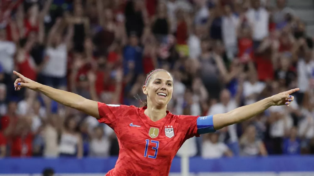 ﻿United States' Alex Morgan celebrates after scoring her side's second goal during the Women's World Cup semifinal soccer match between England and the United States, at the Stade de Lyon, outside Lyon, France, Tuesday, July 2, 2019. (AP Photo/Alessandra Tarantino)