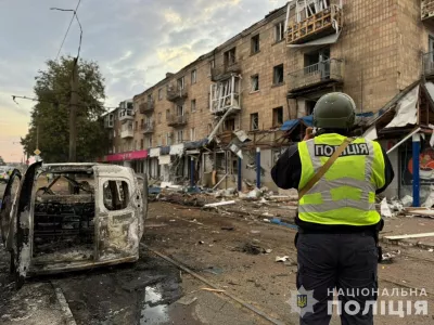 A police officer takes a picture of a residential building damaged during a Russian drone strike, amid Russia's attack on Ukraine, in the town of Konotop, Sumy region, Ukraine September 12, 2024. Press service of the National Police of Ukraine in Sumy region/Handout via REUTERS ATTENTION EDITORS - THIS IMAGE HAS BEEN SUPPLIED BY A THIRD PARTY. DO NOT OBSCURE LOGO.