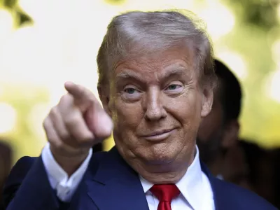 Republican presidential nominee former President Donald Trump motions while attending the 9/11 Memorial ceremony on the 23rd anniversary of the Sept. 11, 2001 terror attacks, Wednesday, Sept. 11, 2024, in New York. (AP Photo/Yuki Iwamura)