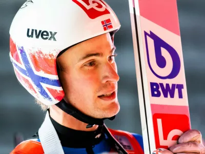 FILED - 10 January 2021, Baden-Wuerttemberg, Titisee-Neustadt: Norway's Daniel Andre Tande stands in the outrun zone of the Hochfirstschanze during the men's large hill 2nd round at the Nordic skiing World Cup. Olympic ski jumping champion Daniel-Andre Tande of Norway has announced his retirement on Wednesday evening. Photo: Philipp von Ditfurth/dpa