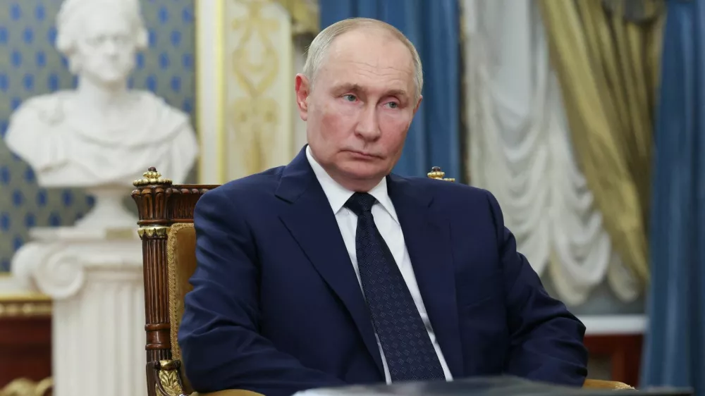 Russia's President Vladimir Putin attends a meeting with Chairman of the Constitutional Court Valery Zorkin in Saint Petersburg, Russia September 12, 2024. Sputnik/Alexander Kazakov/Pool via REUTERS ATTENTION EDITORS - THIS IMAGE WAS PROVIDED BY A THIRD PARTY.