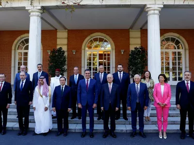 Spain's Prime Minister Pedro Sanchez poses for a family photo with Spain's Foreign Minister Jose Manuel Albares, Spain's Secretary General for Foreign Affairs Emma Aparici, European Union foreign policy chief Josep Borrell, Palestinian Prime Minister Mohammad Mustafa, Saudi Arabia's Foreign Minister Prince Faisal bin Farhan Al-Saud, Jordan's Foreign Minister Ayman Safadi, Slovenian Foreign Minister Tanja Fajon, Norway's Foreign Minister Espen Barth Eide, Turkey's Foreign Minister Hakan Fidan, Egypt's Foreign Minister Badr Abdelatty, Secretary-General of the Arab League Ahmed Aboul Gheit, Secretary-General of the Organisation of Islamic Cooperation Hissein Brahim Taha, Qatar's Minister of State Mohammed bin Abdulaziz Al-Khulaifi, Bahrain's Undersecretary of the Ministry of Foreign Affairs for Political Affairs Shaikh Abdulla bin Ahmed Al Khalifa and Ireland's UN Policy Director and Director of the UN Security Council Task Team Gerard Keown, on the day of a meeting at Moncloa Palace in Madrid, Spain, September 13, 2024. REUTERS/Susana Vera REFILE - REMOVES ID - "NIGERIA'S PERMANENT SECRETARY OF THE MINISTRY OF FOREIGN AFFAIRS DUNOMA UMAR AHMED\