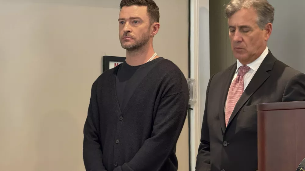 Justin Timberlake, left, appears in court with his attorney Edward Burke, Friday, Sept. 13, 2024, in Sag Harbor, N.Y. (T E McMorrow/Pool Photo via AP)