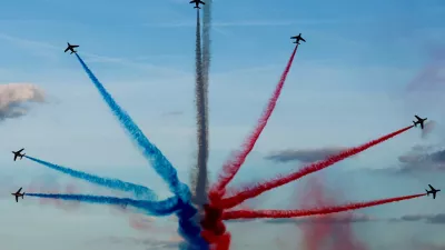 Aircrafts of the Patrouille de France fly over Paris during a parade at the Champs-Elysees avenue for all the French athletes who participated in the 2024 Olympics and Paralympics, in Paris, France September 14, 2024. REUTERS/Gonzalo Fuentes/Pool   TPX IMAGES OF THE DAY