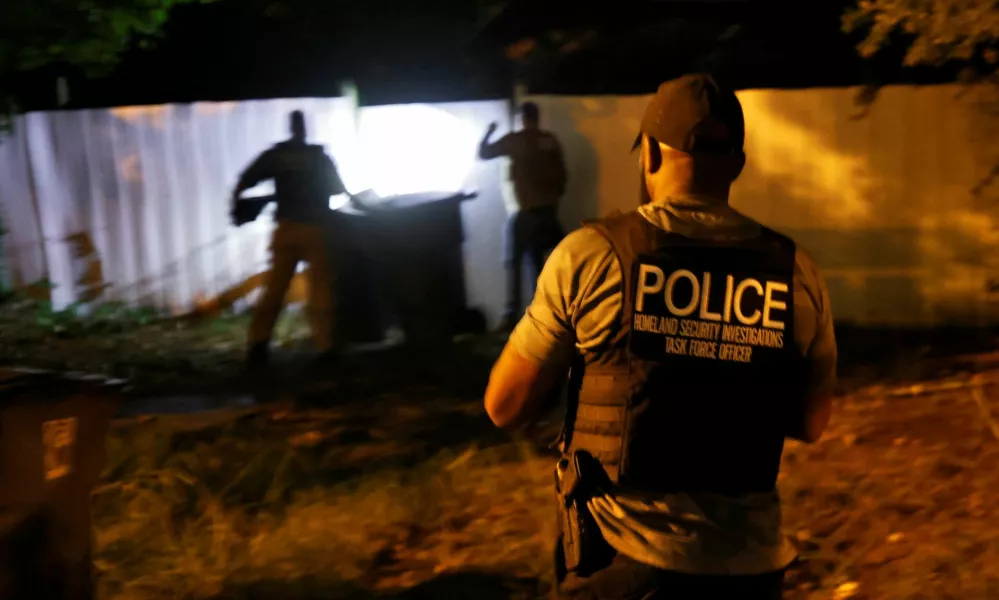 Secret Service and Homeland Security agents check a former home of a suspect named by news organizations as Ryan W. Routh as the FBI investigates what they said was an apparent assassination attempt in Florida on Republican presidential nominee and former U.S. President Donald Trump, in Greensboro, North Carolina, U.S. September 15, 2024. REUTERS/Jonathan Drake