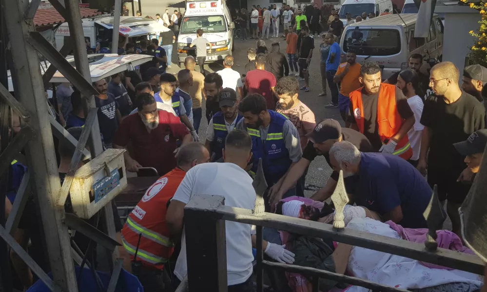 Civil Defense first-responders carry a man who was wounded after his handheld pager exploded, in the southern port city of Sidon, Lebanon, Tuesday, Sept. 17, 2024.(AP Photo)