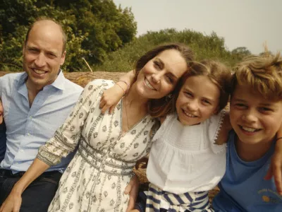 This photo provided by Kensington Palace on Monday, Sept. 9, 2024, shows Kate, Princess of Wales and Prince William with their children Prince George, right, Princess Charlotte and Prince Louis, left. (Will Warr/Kensington Palace via AP)