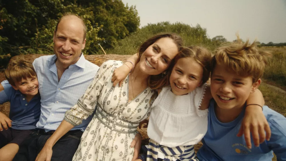 This photo provided by Kensington Palace on Monday, Sept. 9, 2024, shows Kate, Princess of Wales and Prince William with their children Prince George, right, Princess Charlotte and Prince Louis, left. (Will Warr/Kensington Palace via AP)