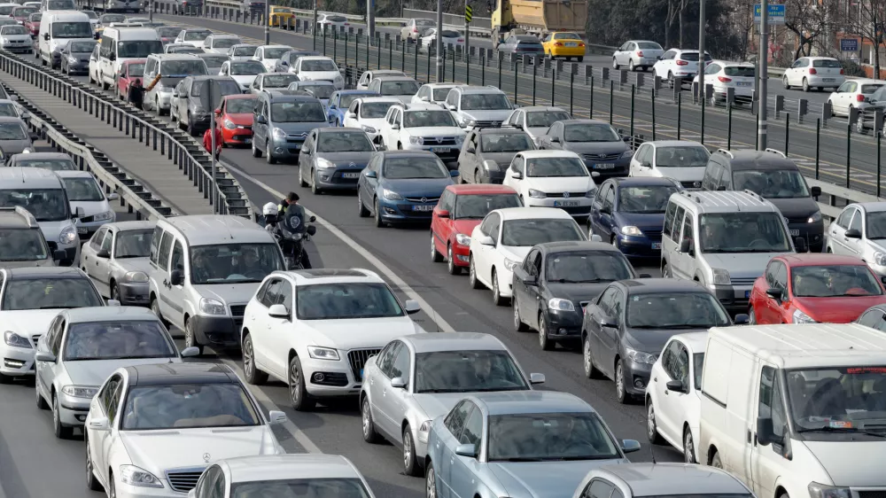 Istanbul, Turkey - February 8, 2014: Cars driving on Zincirlikuyu District in istanbul. Heavy traffic moves slowly on a Zincirlikuyu district in İstanbul are usually crowded.