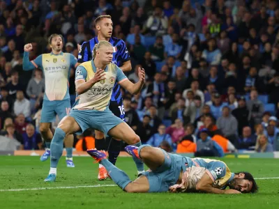 Soccer Football - Champions League - Manchester City v Inter Milan - Etihad Stadium, Manchester, Britain - September 18, 2024 Manchester City's Ilkay Gundogan and Manchester City's Erling Haaland react Action Images via Reuters/Lee Smith