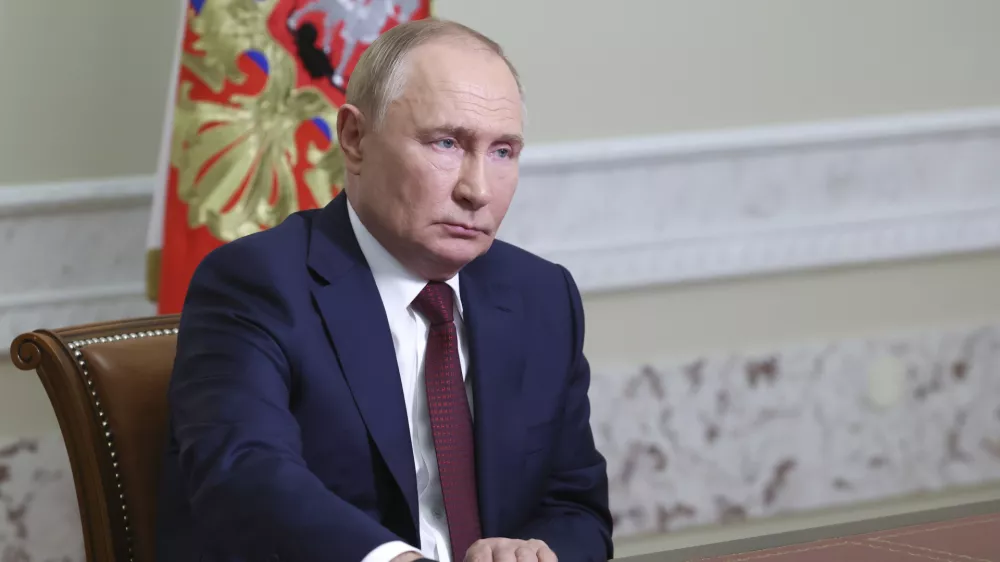 Russian President Vladimir Putin holds a meeting with the elected heads of Russia's constituent entities via videoconference at the Constantine Palace in Strelna in the suburb of St. Petersburg, Russia, Wednesday, Sept. 18, 2024. (Alexander Kazakov, Sputnik, Kremlin Pool Photo via AP)