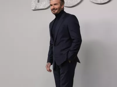 Former soccer star David Beckham attends the Boss Spring Summer 2025 fashion show, that was presented in Milan, Italy, Wednesday, Sept. 18, 2024. (AP Photo/Antonio Calanni).