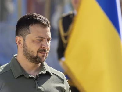 In this photo provided by the Ukrainian Presidential Press Office, Ukrainian President Volodymyr Zelenskyy attends an event for marking Statehood Day in Mykhailivska Square in Kyiv, Friday, July 28, 2023. (Ukrainian Presidential Press Office via AP)