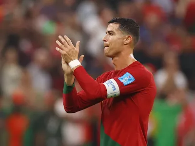 Soccer Football - FIFA World Cup Qatar 2022 - Round of 16 - Portugal v Switzerland - Lusail Stadium, Lusail, Qatar - December 6, 2022 Portugal's Cristiano Ronaldo applauds fans after qualifying for the quarter finals REUTERS/Kai Pfaffenbach REFILE - CORRECTING TEMPLATE