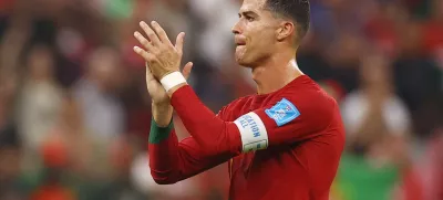 Soccer Football - FIFA World Cup Qatar 2022 - Round of 16 - Portugal v Switzerland - Lusail Stadium, Lusail, Qatar - December 6, 2022 Portugal's Cristiano Ronaldo applauds fans after qualifying for the quarter finals REUTERS/Kai Pfaffenbach REFILE - CORRECTING TEMPLATE