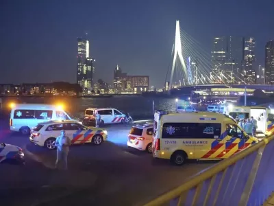 In this image made from video provided by Media TV, personnel respond to a stabbing incident late Thursday, Sept. 19, 2024, in the port city of Rotterdam, Netherlands. (Media TV via AP)