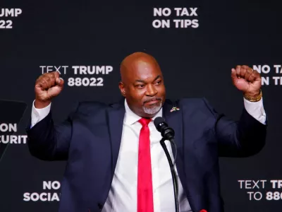 FILE PHOTO: Republican candidate for North Carolina Governor and current North Carolina Lieutenant Governor, Mark Robinson gestures as he attends a campaign event in Asheville, North Carolina, U.S. August 14, 2024. REUTERS/Jonathan Drake/File Photo