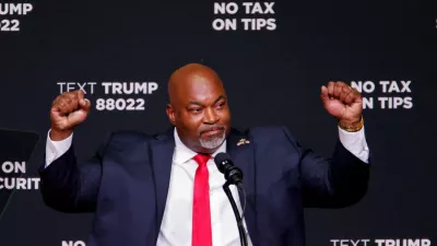 FILE PHOTO: Republican candidate for North Carolina Governor and current North Carolina Lieutenant Governor, Mark Robinson gestures as he attends a campaign event in Asheville, North Carolina, U.S. August 14, 2024. REUTERS/Jonathan Drake/File Photo