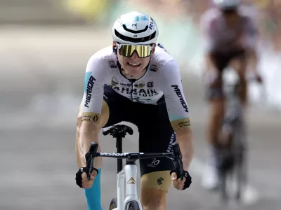 Cycling - Tour de France - Stage 19 - Moirans-En-Montagne to Poligny - France - July 21, 2023 Team Bahrain Victorious' Matej Mohoric crosses the finish line to win stage 19 REUTERS/Stephane Mahe