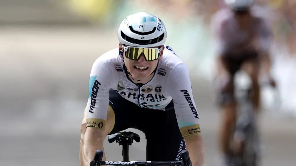 Cycling - Tour de France - Stage 19 - Moirans-En-Montagne to Poligny - France - July 21, 2023 Team Bahrain Victorious' Matej Mohoric crosses the finish line to win stage 19 REUTERS/Stephane Mahe