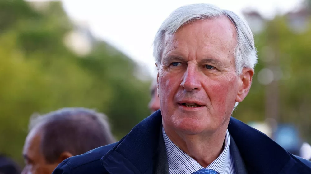 FILE PHOTO: France's Prime minister Michel Barnier looks on during a parade of French athletes who participated in the 2024 Olympics and Paralympics in Paris, France September 14, 2024. REUTERS/Sarah Meyssonnier/Pool/File Photo