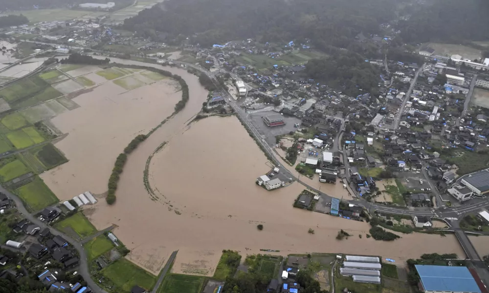 This aerial photo shows the flooded area after heavy rain in Wajima, Ishikawa prefecture, Saturday, Sept. 21, 2024. (Kyodo News via AP)