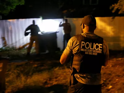 Secret Service and Homeland Security agents check a former home of a suspect named by news organizations as Ryan W. Routh as the FBI investigates what they said was an apparent assassination attempt in Florida on Republican presidential nominee and former U.S. President Donald Trump, in Greensboro, North Carolina, U.S. September 15, 2024. REUTERS/Jonathan Drake