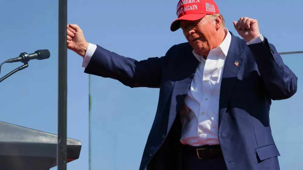 Republican presidential nominee and former U.S. President Donald Trump gestures at a campaign rally in Wilmington, North Carolina, U.S., September 21, 2024. REUTERS/Brian Snyder