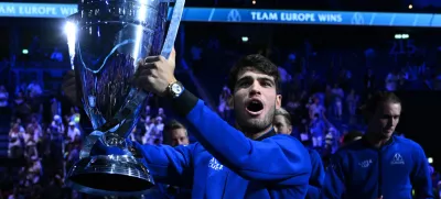 Tennis - Laver Cup - Uber Arena, Berlin, Germany - September 22, 2024 Team Europe's Carlos Alcaraz celebrates with the trophy after winning the Laver Cup REUTERS/Annegret Hilse