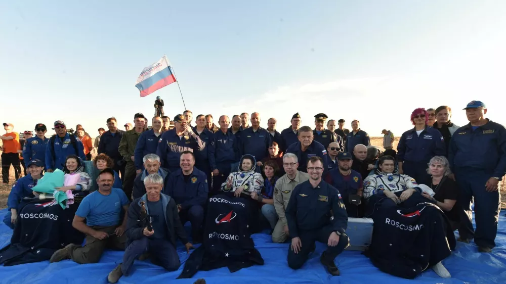 The International Space Station (ISS) crew, formed of Roscosmos cosmonauts Oleg Kononenko, Nikolai Chub and NASA astronaut Tracy Dyson, pose with ground personnel after landing in a remote area near Zhezkazgan, Kazakhstan September 23, 2024. GCTC/Roscosmos/Handout via REUTERS ATTENTION EDITORS - THIS IMAGE HAS BEEN SUPPLIED BY A THIRD PARTY. MANDATORY CREDIT.