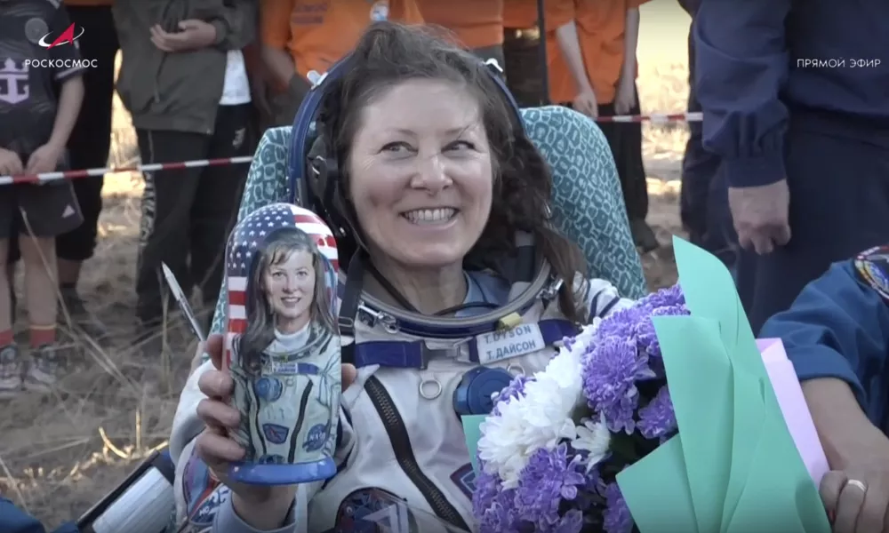 In this photo taken from video released by Roscosmos space corporation, the NASA astronaut Tracy Dyson holds a Russian traditional Matryoshka wooden doll depicting her shortly after the landing of the Russian Soyuz MS-25 space capsule carrying the NASA astronaut Tracy Dyson and the Roscosmos cosmonauts Oleg Kononenko and Nikolai Chub, south-east of the Kazakh town of Zhezkazgan, Kazakhstan, Monday, Sept. 23, 2024. (Roscosmos space corporation via AP)