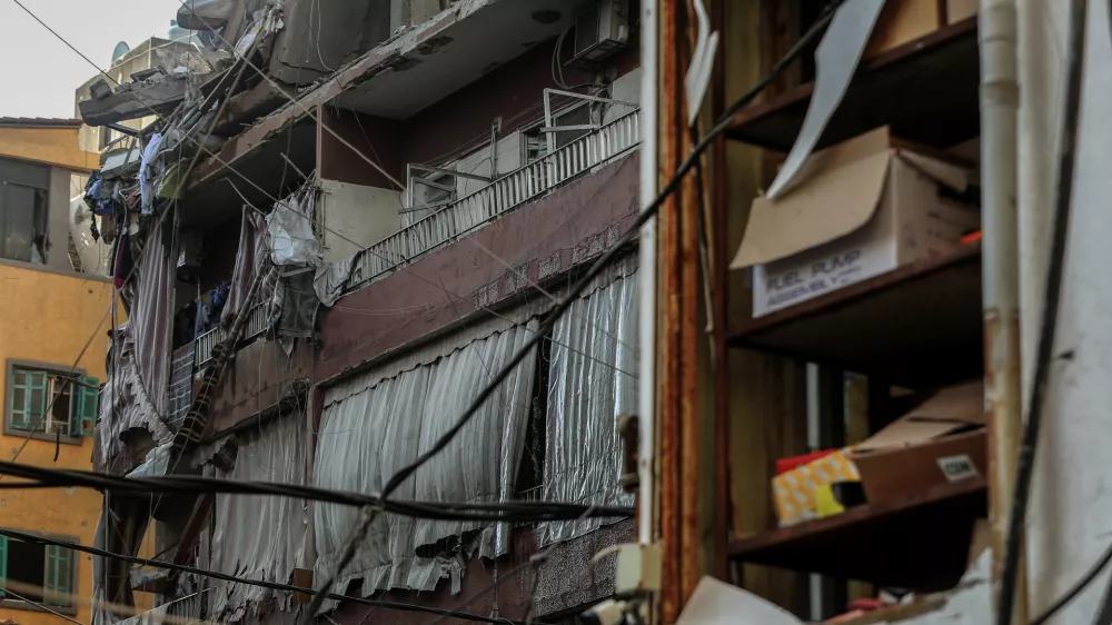 24 September 2024, Lebanon, Beirut: A view of the damage in a building hit by an Israeli airstrike in Beirut southern suburb. According to the Lebanese Ministry of Health, six people were killed and 15 others were wounded in the strike, which was targeting Hezbollah's rocket chief, according to the Israeli military. Photo: Marwan Naamani/dpa