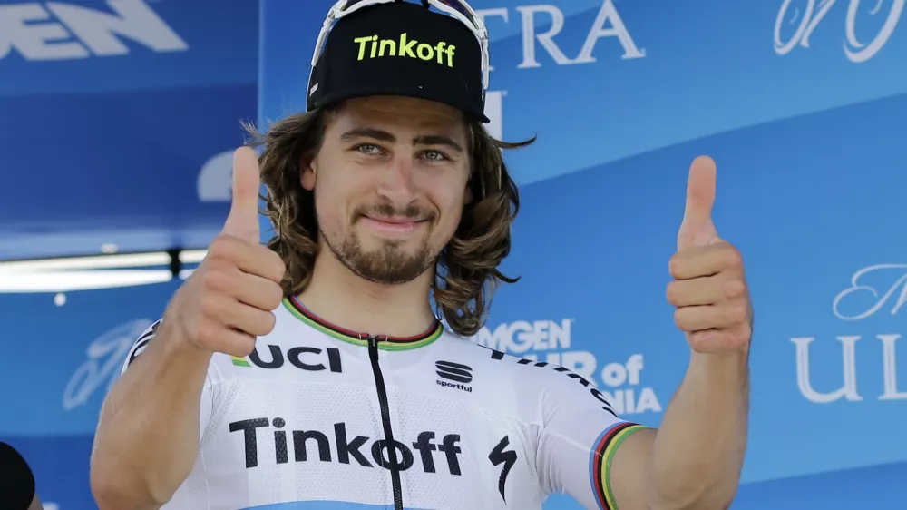 ﻿FILE - In this May 15, 2016, file photo, Peter Sagan, of Slovakia, reacts after winning stage one of the Amgen Tour of California cycling race, in San Diego. World road race champion Peter Sagan will seek Olympic gold in Rio on his mountain bike. The Slovak Olympic Committee announced Tuesday, June 7, 2016, that Sagan, one of the most popular and successful cyclists in the world, was awarded its lone starting spot in the mountain biking event at the Summer Games. (AP Photo/Gregory Bull, File)