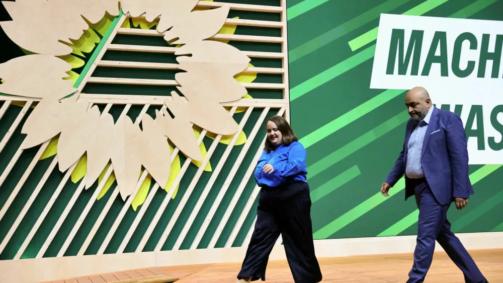 FILE PHOTO: Germany's Green party co-leaders Omid Nouripour and Ricarda Lang leave the stage after being re-elected as leader duo at the Greens party convention in Rheinstetten, near Karlsruhe, Germany, November 24, 2023. The Greens leadership duo quit on September 25, 2024 after a series of election blows. REUTERS/Wolfgang Rattay/File Photo