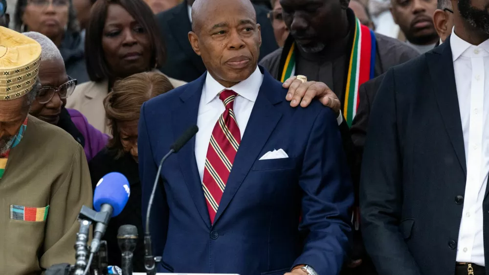 New York City Mayor Eric Adams speaks to the press outside his official residence Gracie Mansion after he was charged with bribery and illegally soliciting a campaign contribution from a foreign national, in New York City, U.S. September 26, 2024. REUTERS/Caitlin Ochs