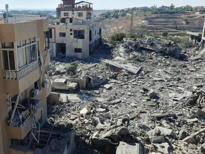 The rubble of destroyed buildings lies at the site of Israeli strikes in Saksakiyeh, southern Lebanon September 26, 2024. REUTERS/Ali Hankir