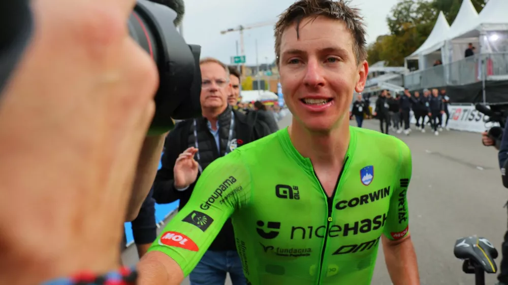 Cycling - UCI World Championships 2024 - Men's Elite Road Race - Zurich, Switzerland - September 29, 2024 Slovenia's Tadej Pogacar reacts after winning the race REUTERS/Denis Balibouse