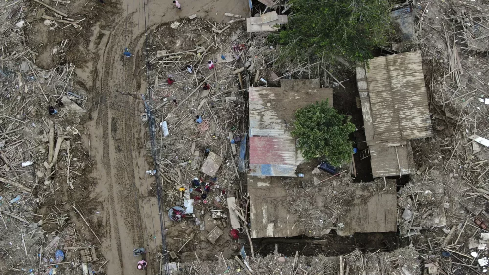 In this aerial image of the Kathmandu valley, debris is seen in Kathmandu, Nepal, Monday, Sept. 30, 2024 in the aftermath of a flood caused by heavy rains. (AP Photo/Gopen Rai)