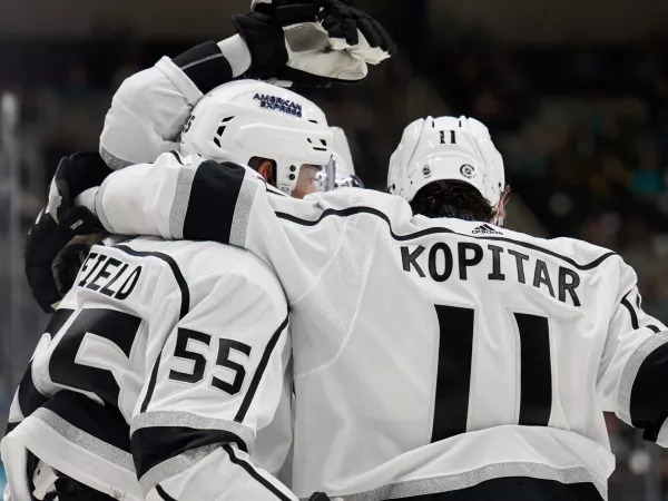 Apr 4, 2024; San Jose, California, USA; Los Angeles Kings center Anze Kopitar (11) and right wing Quinton Byfield (55) celebrate after a goal scored against the San Jose Sharks during the first period at SAP Center at San Jose. Mandatory Credit: Robert Edwards-USA TODAY Sports