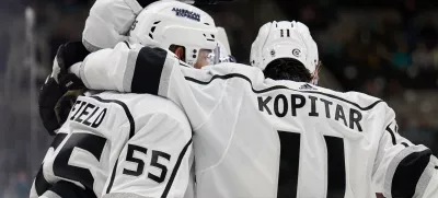 Apr 4, 2024; San Jose, California, USA; Los Angeles Kings center Anze Kopitar (11) and right wing Quinton Byfield (55) celebrate after a goal scored against the San Jose Sharks during the first period at SAP Center at San Jose. Mandatory Credit: Robert Edwards-USA TODAY Sports