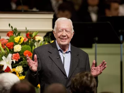 FILE - Former President Jimmy Carter teaches Sunday School class at the Maranatha Baptist Church in his hometown of Plains, Ga., Aug. 23, 2015. (AP Photo/David Goldman, File)