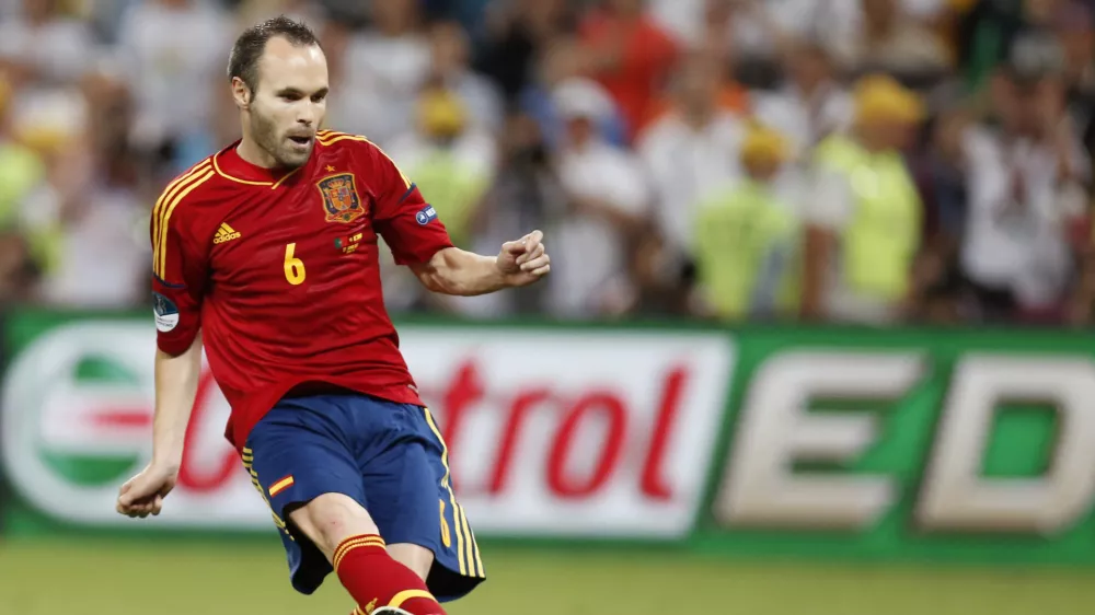 Spain's Andres Iniesta scores his penalty shootout during the Euro 2012 soccer championship semifinal match between Spain and Portugal in Donetsk, Ukraine, Thursday, June 28, 2012. (AP Photo/Jon Super)