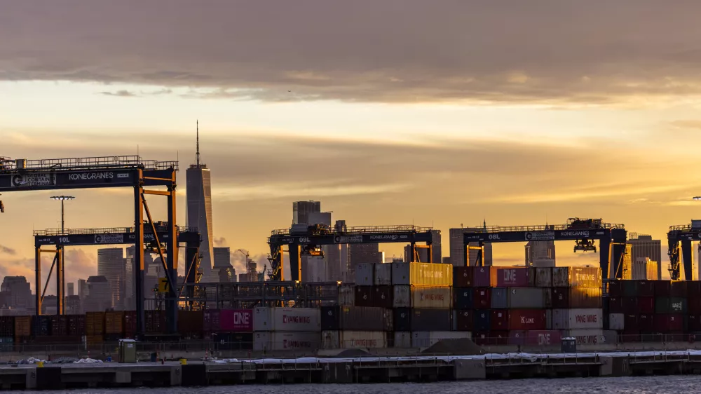 Cranes and shipping containers are seen at Port Jersey with the New York City skyline in the background during a port strike, Tuesday, Oct. 1, 2024, in Bayonne. (AP Photo/Eduardo Munoz Alvarez)