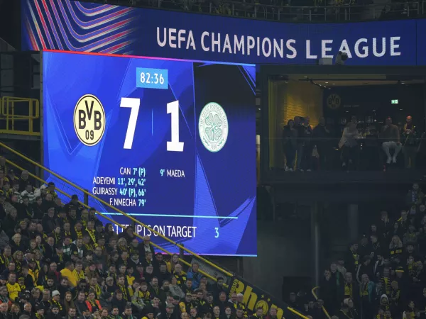 Dortmund fans watch the Champions League opening phase soccer match between Borussia Dortmund and Celtic FC at the BVB Stadion in Dortmund, Germany, Tuesday, Oct. 1, 2024. Dortmund won 7-1. (AP Photo/Martin Meissner)