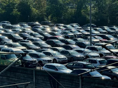 FILE PHOTO: FILE PHOTO: Cars are parked near the power station of the Volkswagen plant in Wolfsburg, Germany, September 4, 2024.  REUTERS/Stephane Nitschke/File Photo/File Photo