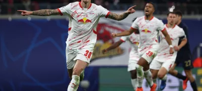 02 October 2024, Saxony, Leipzig: Leipzig's Benjamin Sesko celebrates scoring his side's second goal during the UEFA Champions League soccer match between RB Leipzig and Juventus at the Red Bull Arena. Photo: Jan Woitas/dpa