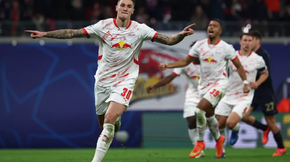 02 October 2024, Saxony, Leipzig: Leipzig's Benjamin Sesko celebrates scoring his side's second goal during the UEFA Champions League soccer match between RB Leipzig and Juventus at the Red Bull Arena. Photo: Jan Woitas/dpa