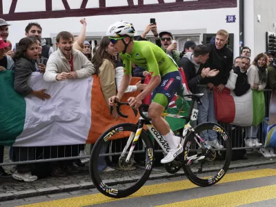 Slovenia's Tadej Pogacar attacks during the Men Elite road race of the Cycling and Para-cycling Road World Championships in Zurich, Switzerland, Sunday, Sept. 29, 2024. (AP Photo/Peter Dejong)